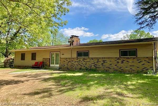 28 Acres of Land with Home for Sale in Sumpter Township, Michigan