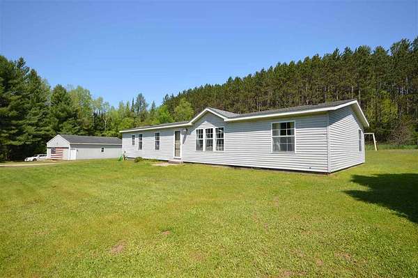 4.56 Acres of Land with Home for Sale in East Jordan, Michigan