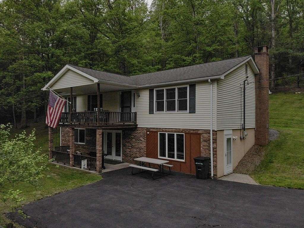 9 Acres of Land with Home for Sale in Austin, Pennsylvania