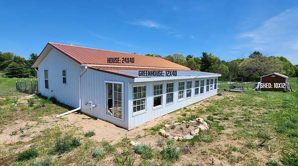 6.52 Acres of Land with Home for Sale in White Cloud, Michigan