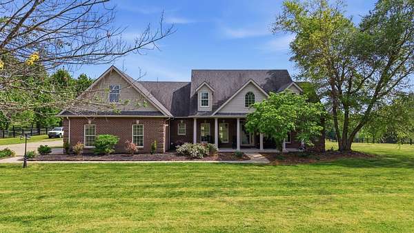 7.4 Acres of Land with Home for Sale in Winchester, Kentucky