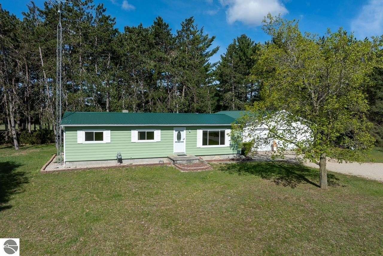 24 Acres of Land with Home for Sale in Weidman, Michigan