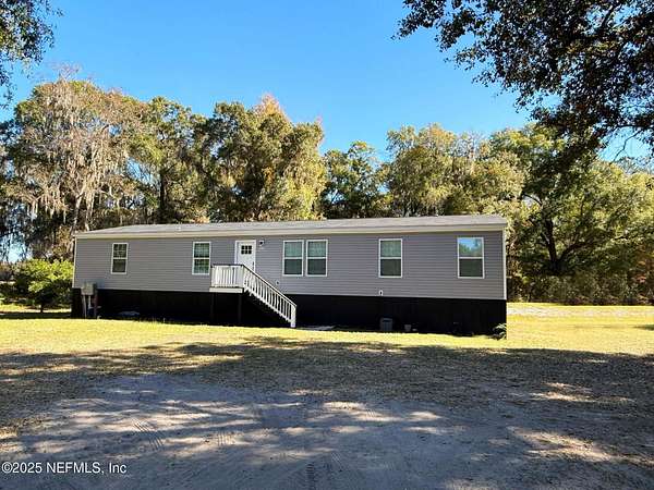 7 Acres of Land with Home for Sale in Starke, Florida