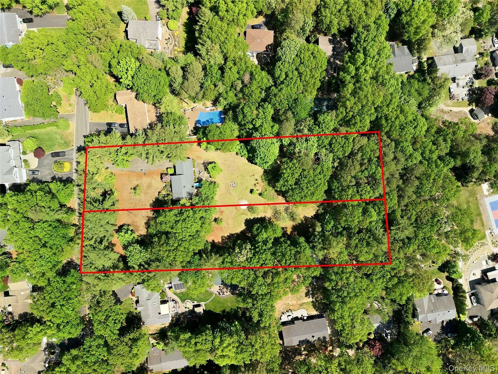 2.1 Acres of Land with Home for Sale in Smithtown, New York