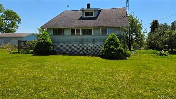 2 Acres of Land with Home for Sale in Moore Township, Michigan