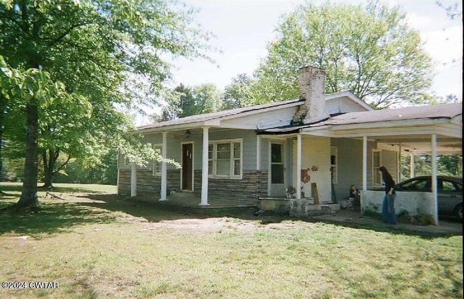4.77 Acres of Land with Home for Sale in Savannah, Tennessee
