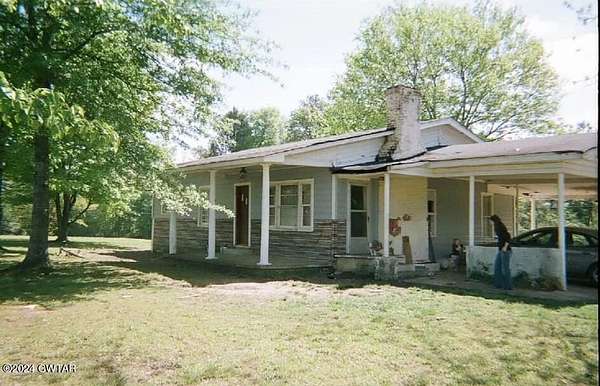 4.77 Acres of Land with Home for Sale in Savannah, Tennessee