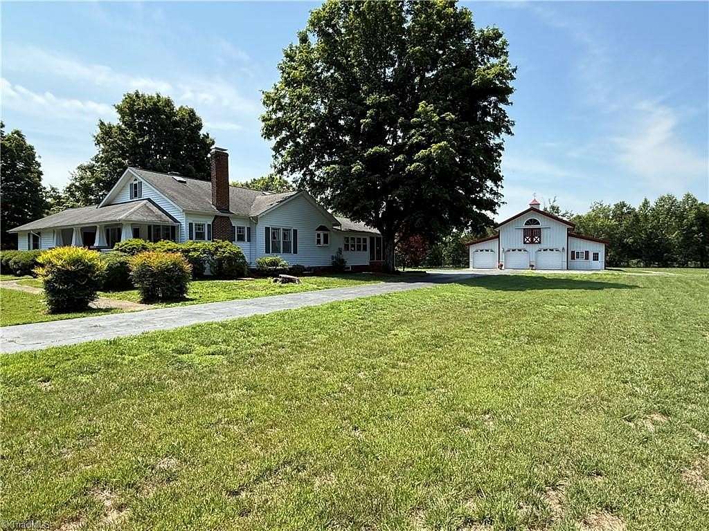 8.74 Acres of Land with Home for Sale in East Bend, North Carolina