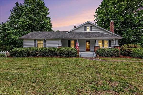 8.74 Acres of Land with Home for Sale in East Bend, North Carolina