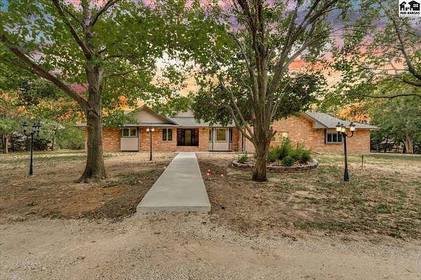 6.68 Acres of Land with Home for Sale in Inman, Kansas