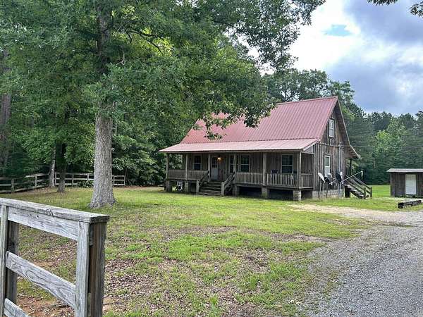 1.64 Acres of Land with Home for Sale in Sheridan, Arkansas