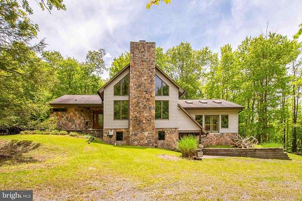 6.89 Acres of Land with Home for Sale in Oakland, Maryland