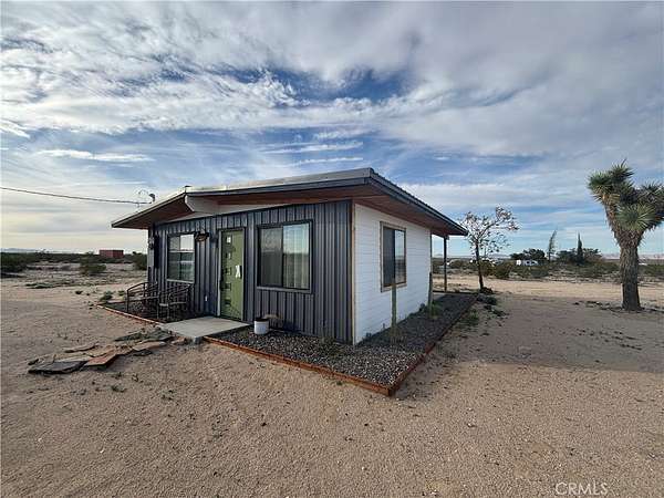 2.5 Acres of Land with Home for Auction in Joshua Tree, California