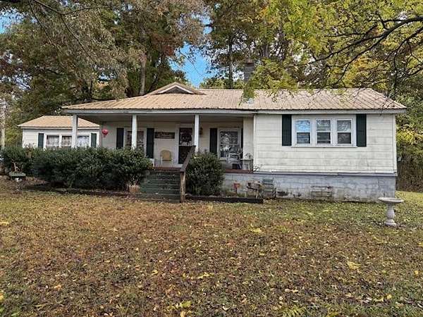 15.7 Acres of Land with Home for Sale in Delano, Tennessee