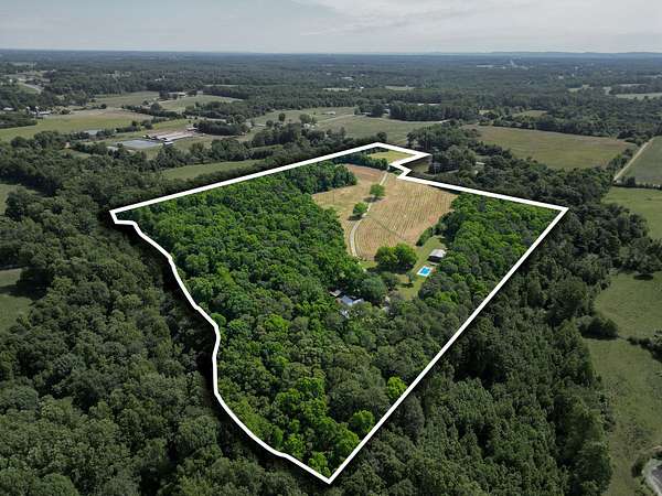 26.4 Acres of Land with Home for Sale in Crossville, Alabama
