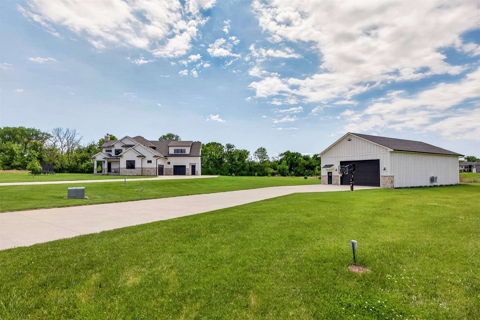 2.77 Acres of Land with Home for Sale in Adel, Iowa