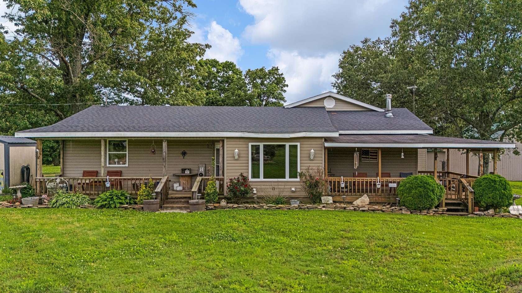 30 Acres of Recreational Land with Home for Sale in Caulfield, Missouri