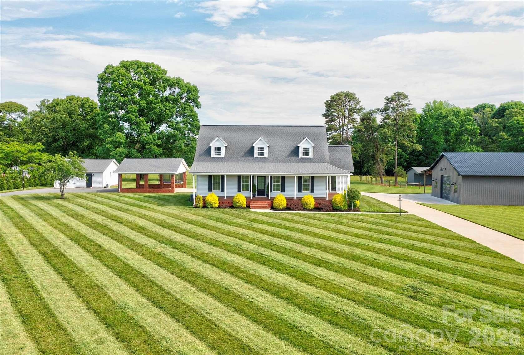 7.28 Acres of Land with Home for Sale in Lawndale, North Carolina