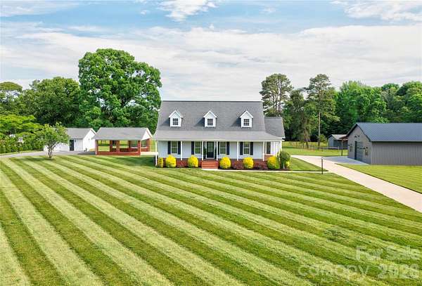 7.28 Acres of Land with Home for Sale in Lawndale, North Carolina