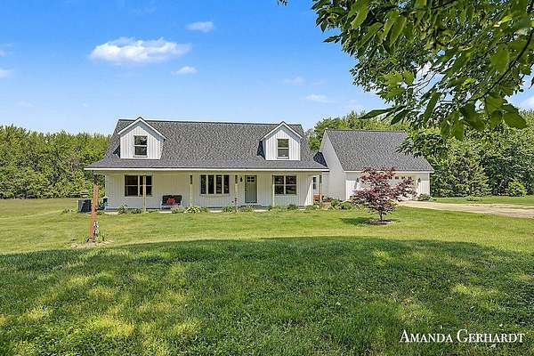 3 Acres of Land with Home for Sale in Caledonia, Michigan