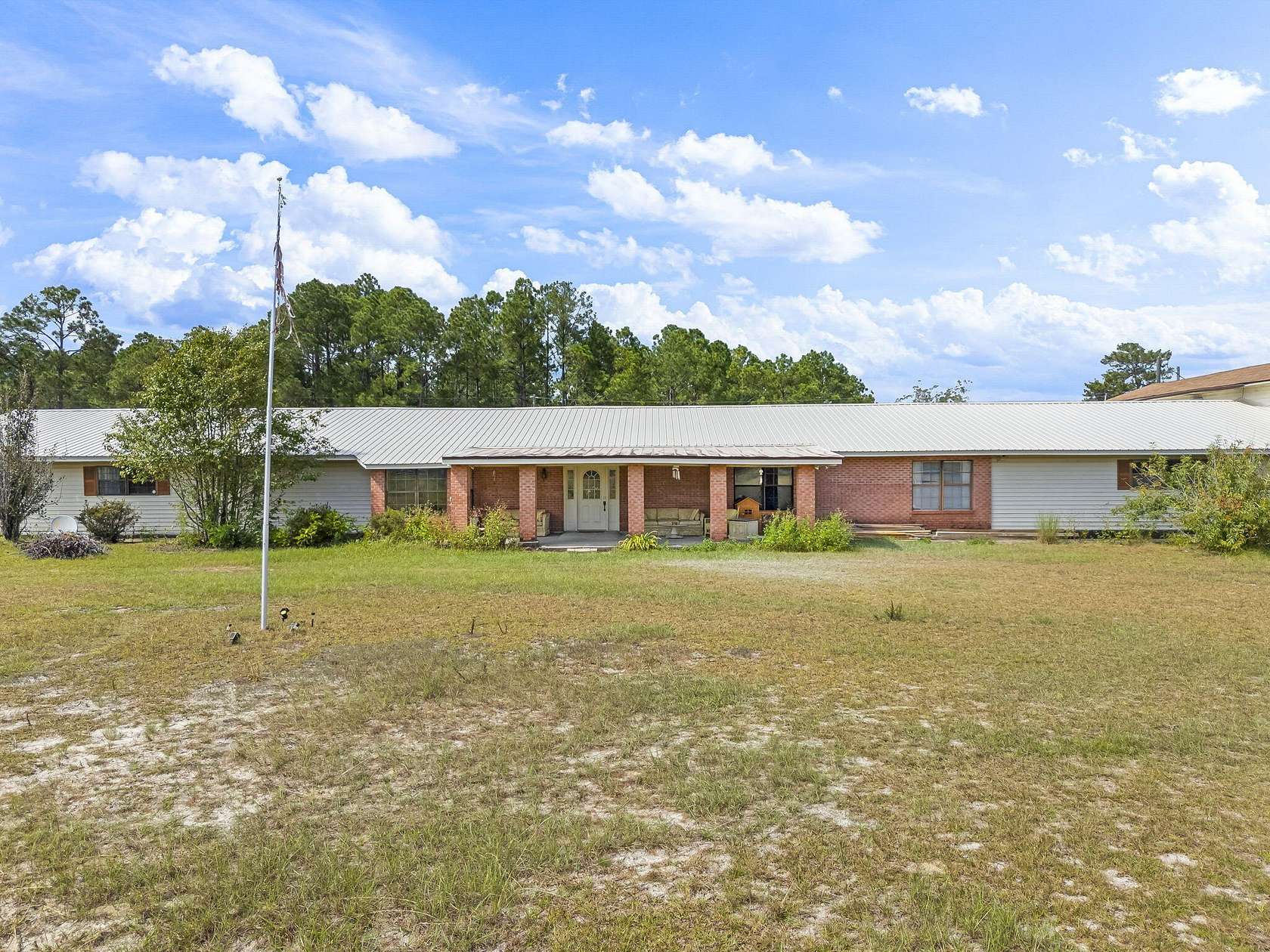 5.25 Acres of Land with Home for Sale in Freeport, Florida