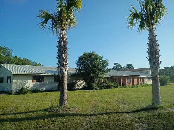 5.25 Acres of Land with Home for Sale in Freeport, Florida