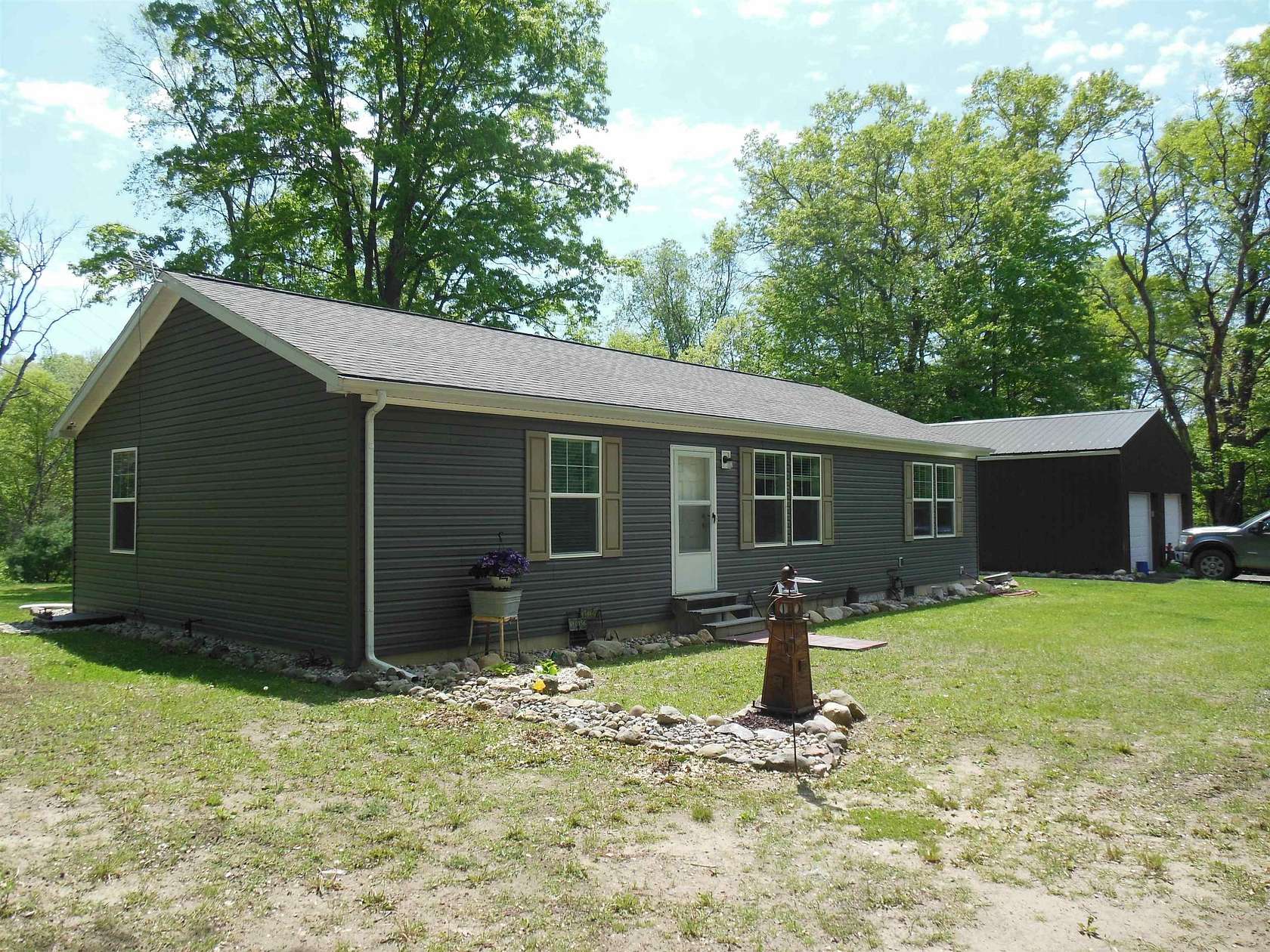 40 Acres of Recreational Land with Home for Sale in Harrison, Michigan