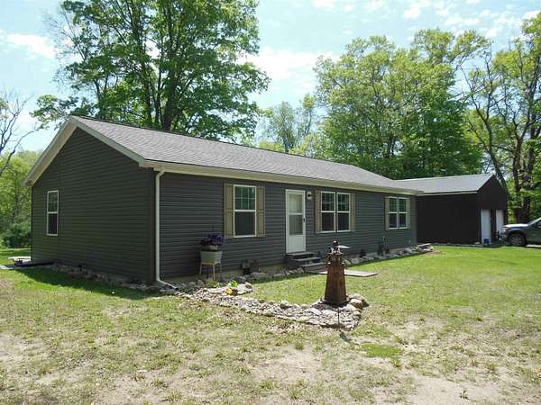40 Acres of Recreational Land with Home for Sale in Harrison, Michigan