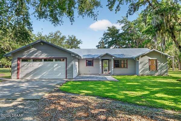2.49 Acres of Land with Home for Sale in Edgewater, Florida
