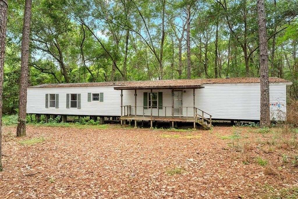 4.42 Acres of Land with Home for Sale in Grand Bay, Alabama