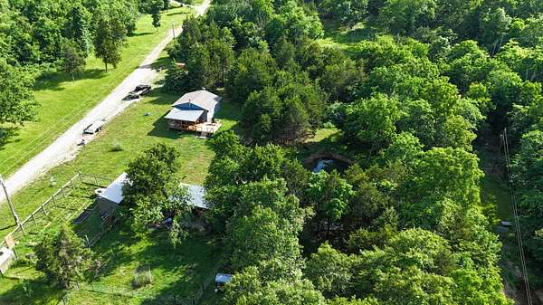 9.5 Acres of Land with Home for Sale in Cabool, Missouri