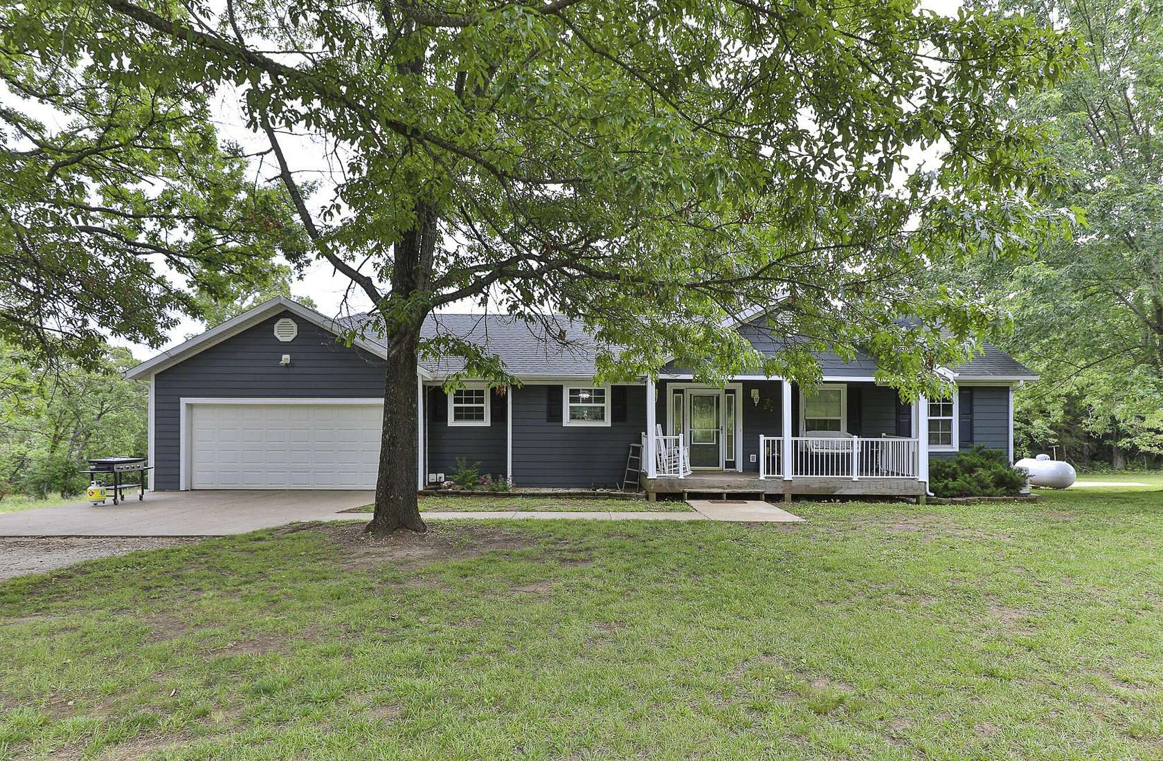 25 Acres of Land with Home for Sale in Greenfield, Missouri