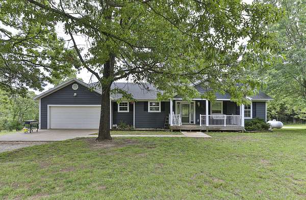 25 Acres of Land with Home for Sale in Greenfield, Missouri