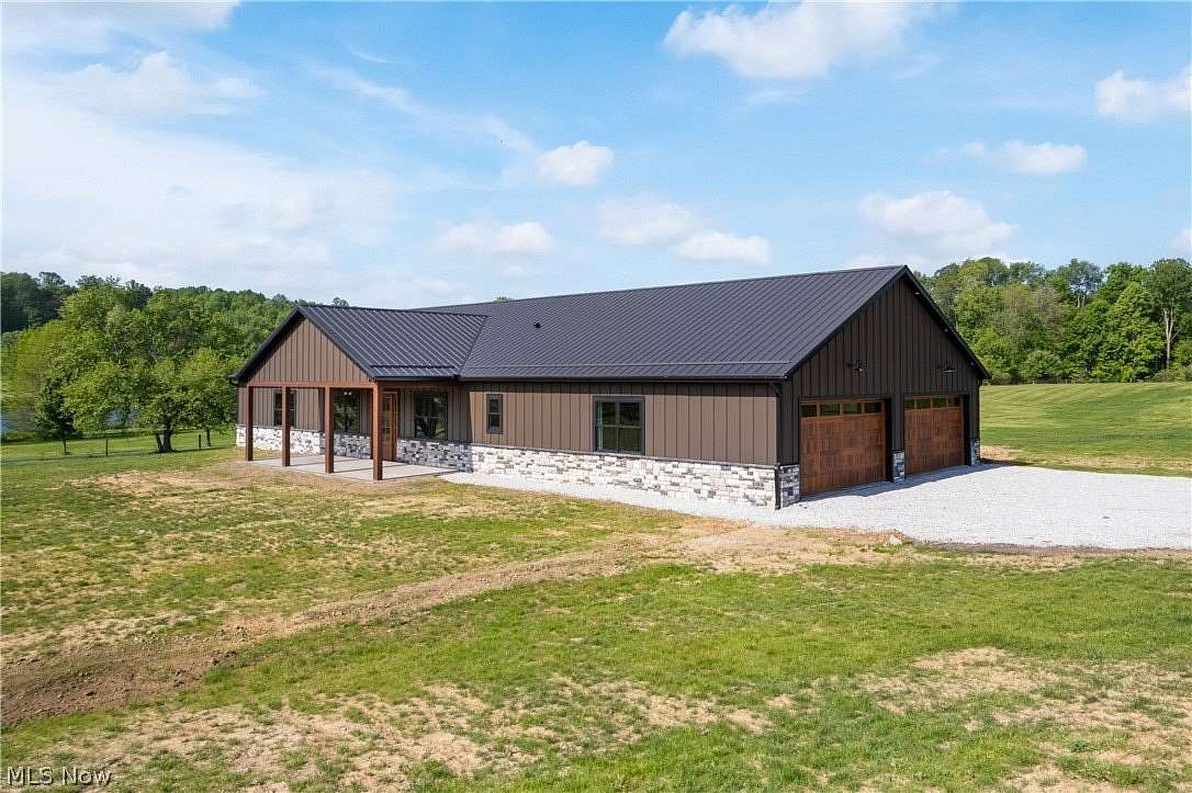 6.18 Acres of Land with Home for Sale in Louisville, Ohio
