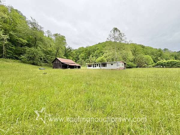 23.8 Acres of Recreational Land with Home for Auction in West Union, West Virginia