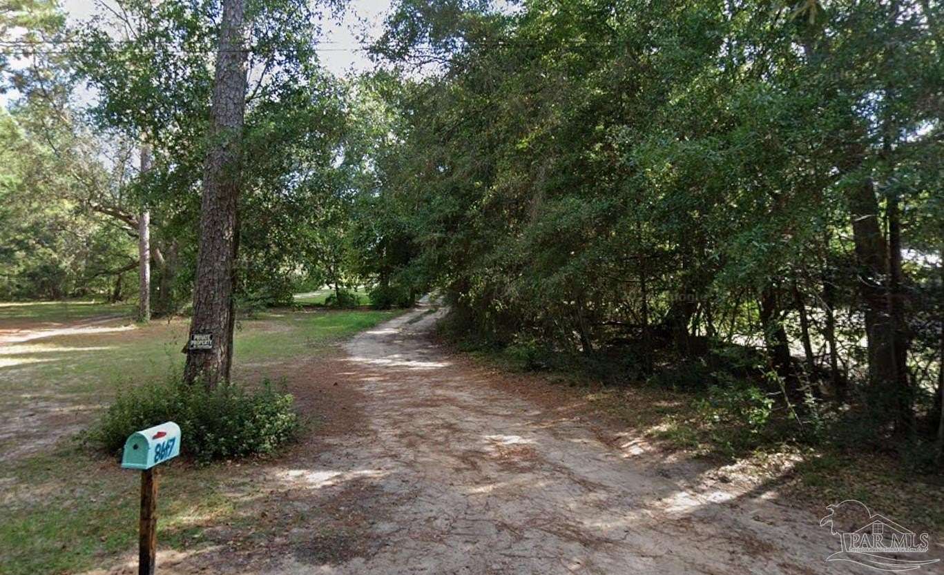 4.24 Acres of Land with Home for Sale in Milton, Florida