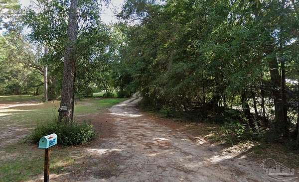 4.24 Acres of Land with Home for Sale in Milton, Florida