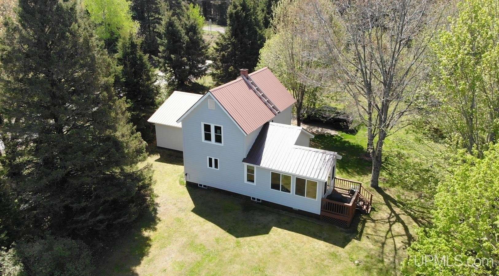 39.5 Acres of Recreational Land with Home for Sale in Toivola, Michigan