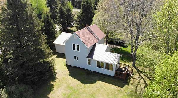 39.5 Acres of Recreational Land with Home for Sale in Toivola, Michigan