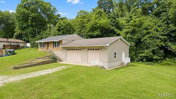 2.4 Acres of Land with Home for Sale in De Soto, Missouri