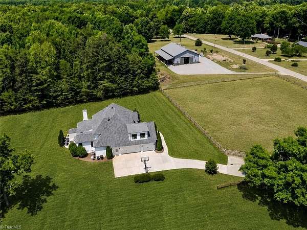 4.84 Acres of Land with Home for Sale in Colfax, North Carolina
