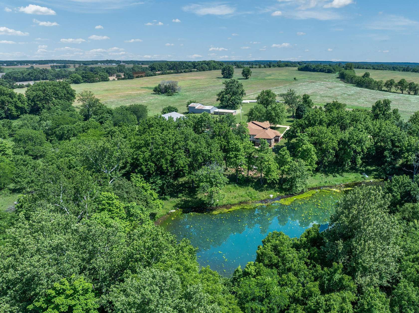142 Acres of Agricultural Land with Home for Sale in Morrisville, Missouri