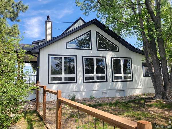 5 Acres of Land with Home for Sale in Loveland, Colorado