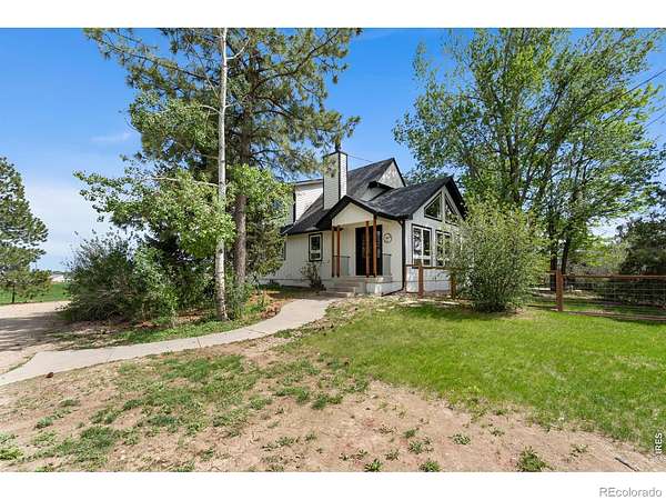 5 Acres of Land with Home for Sale in Loveland, Colorado