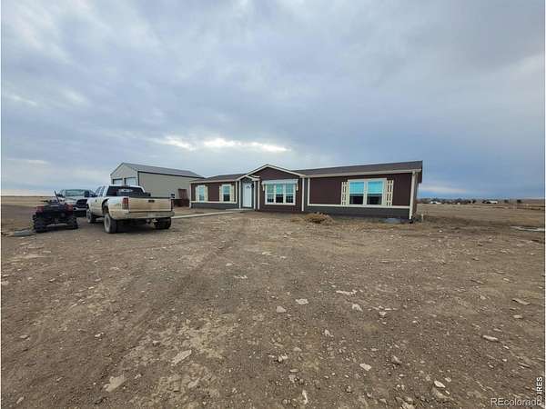 10 Acres of Land with Home for Sale in Briggsdale, Colorado