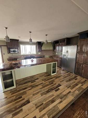 10 Acres of Land with Home for Sale in Briggsdale, Colorado