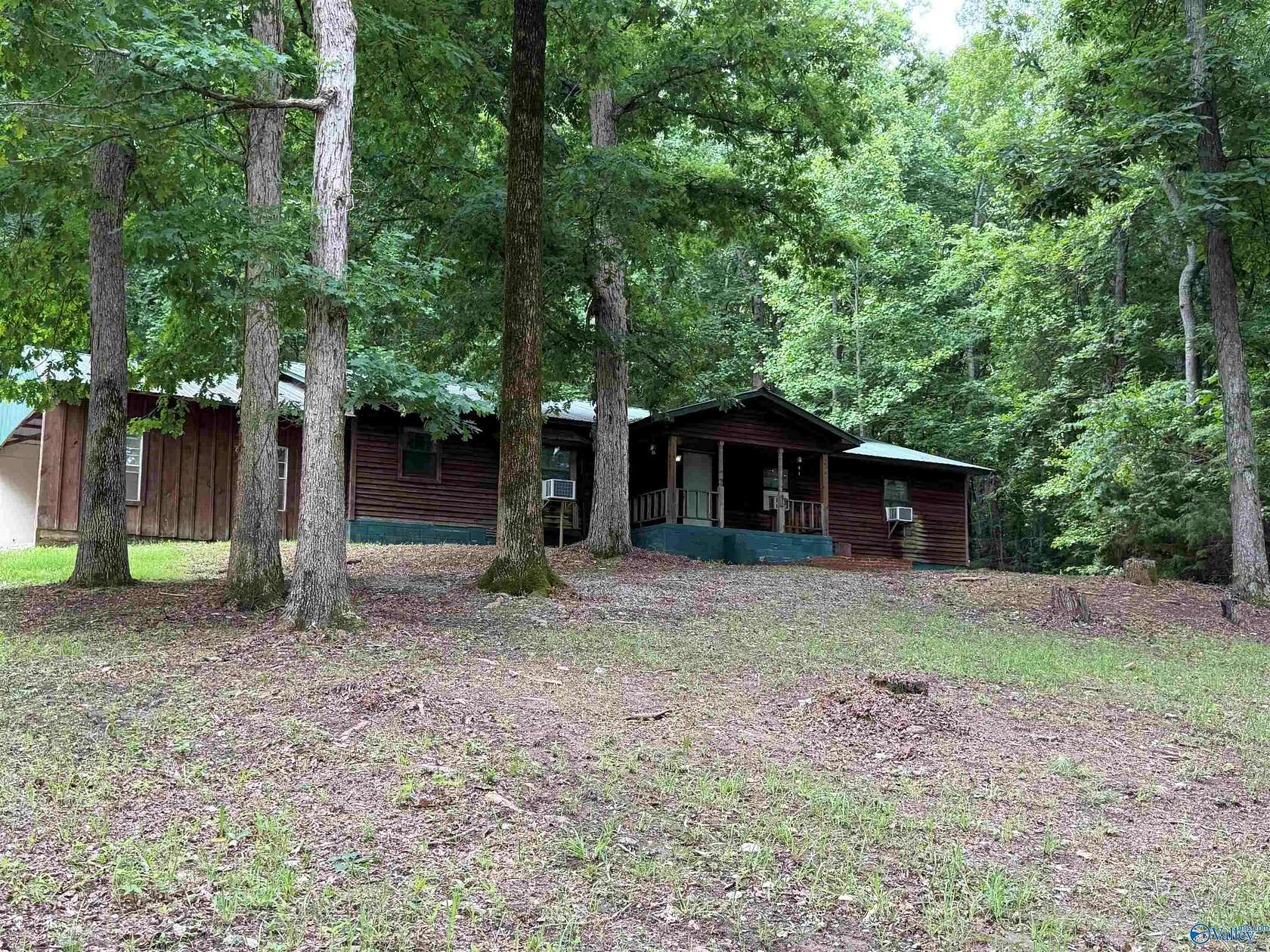 6.66 Acres of Land with Home for Sale in Falkville, Alabama