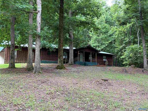 6.66 Acres of Land with Home for Sale in Falkville, Alabama