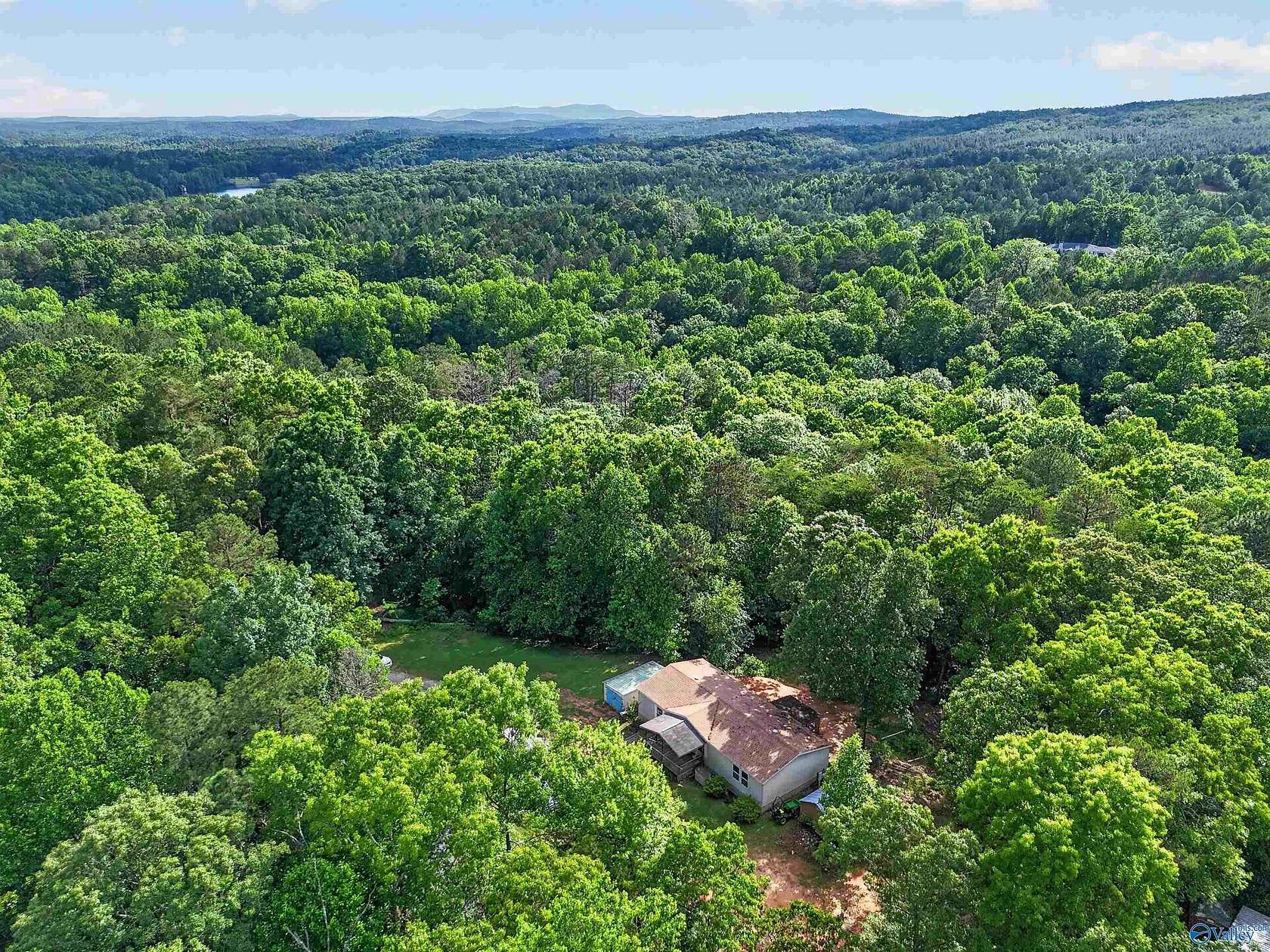 9.25 Acres of Land with Home for Sale in Heflin, Alabama