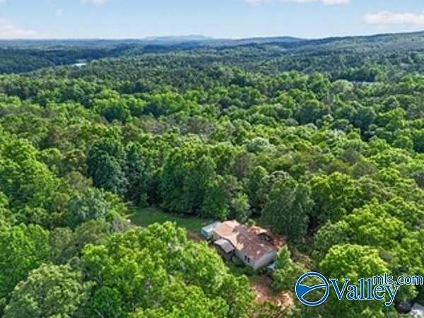 9.25 Acres of Land with Home for Sale in Heflin, Alabama